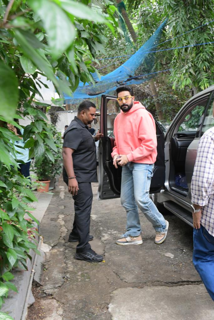 Abhishek's relaxed demeanor and choice of attire formed a harmonious synthesis, redefining casual dressing with a refreshing touch of vibrancy.